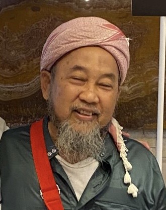 حاج ماليزي ابناؤه جمعوا له تكاليف الحج